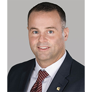 Headshot of John Kuenster