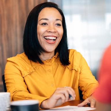 Female consultant smiling with customer