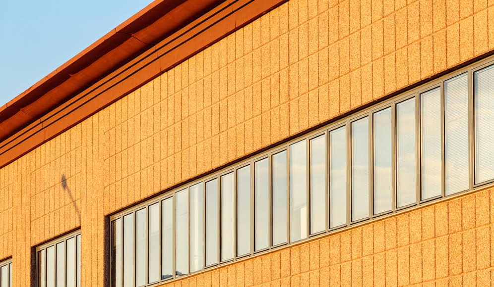 A close-up image of a building with lots of windows