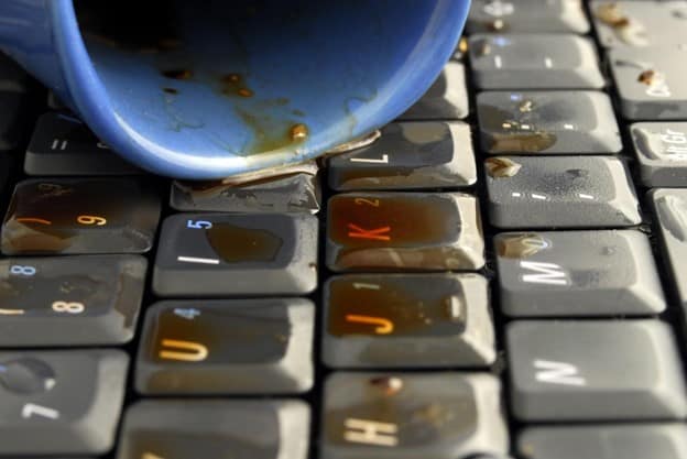A cup of coffee spilled on a client’s keyboard.