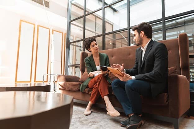 a business consultant visiting the office of a client