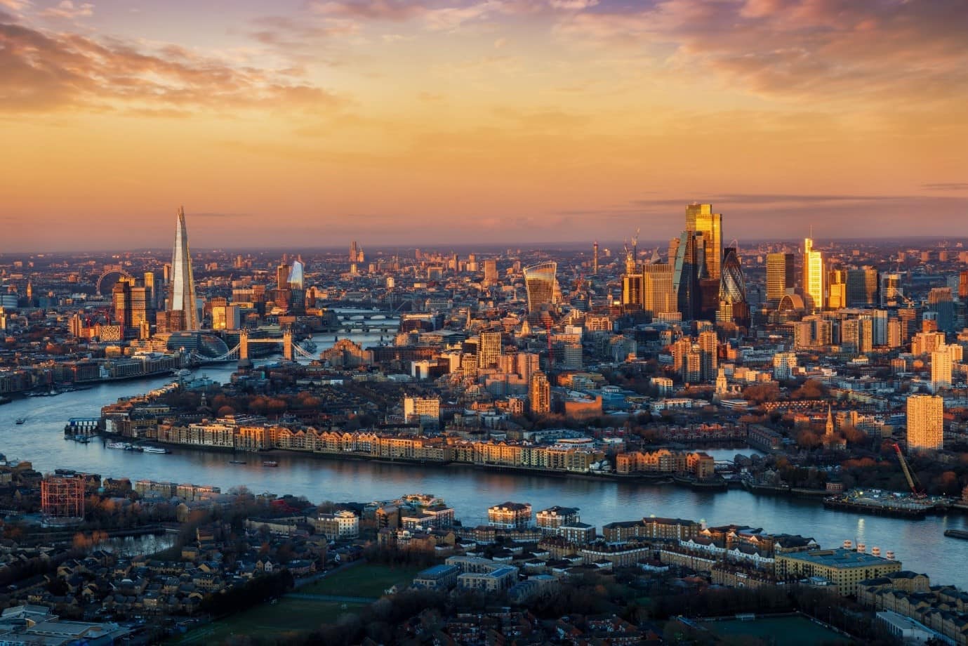 A skyline view of London during sunset