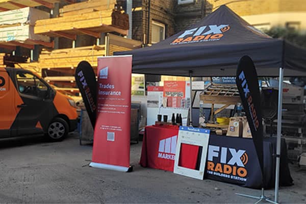 A Markel Direct and Fix Radio stand set up outside of a builders merchant as part of their nationwide tour.