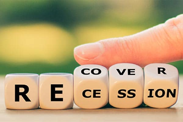 Dice spelling out the word recession.