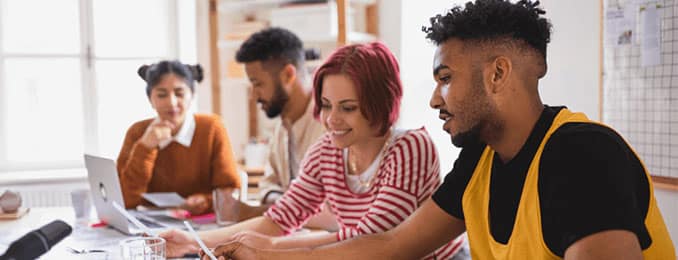 Group of young people in casual meeting/discussion