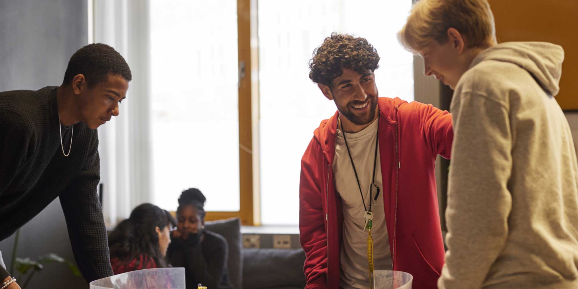 People interacting during an event at a community center