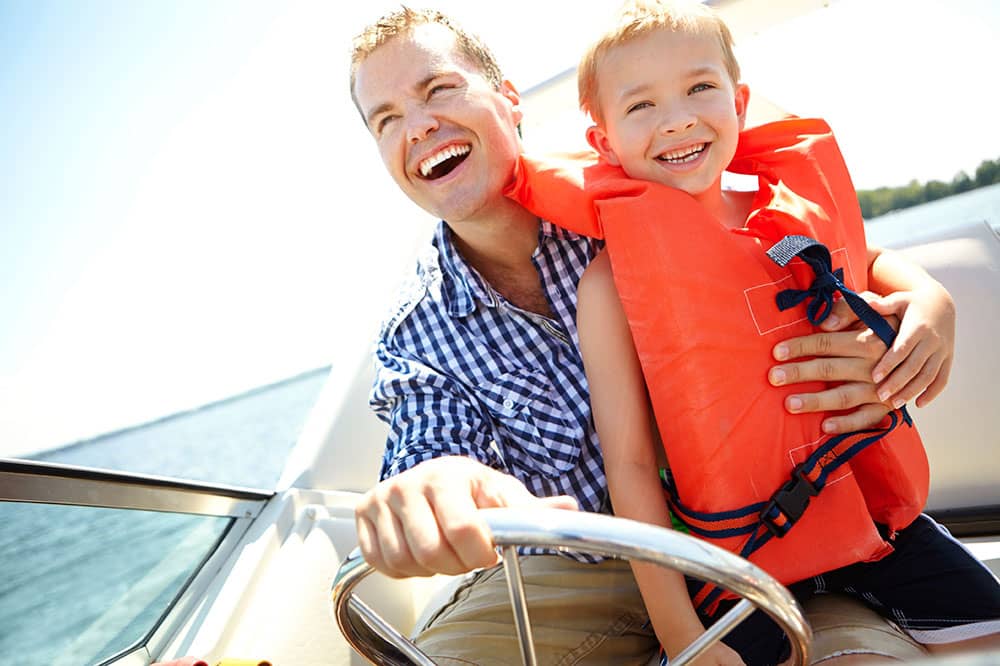 Father and son boating