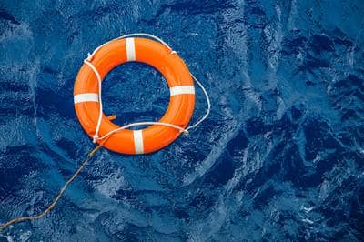 Life Preserver on Blue Water