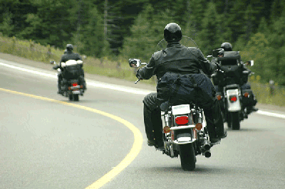 Three men on a motorcycle road trip