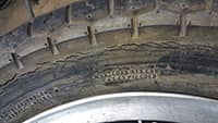 Cracked motorcycle tire sidewall
