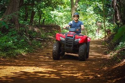 man driving four wheeler in Costa Rica