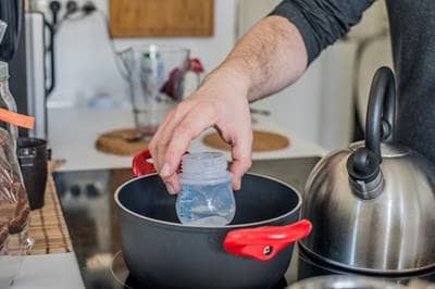 Warming Baby Bottle on Stove