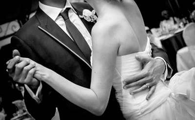 Newlyweds dancing on wedding day